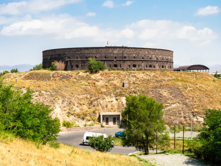 view of Black Fortress (Russian imperial fortress in Gyumri city, Shirak Province, Armenia) on hill on sunny summer dayの写真素材