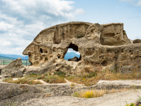 remains of palace in Uplistsikhe Cave Town in Georgia on sunny summer dayの写真素材