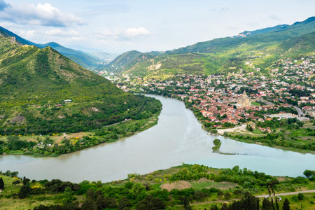 above view of confluence of Kura and Aragvi rivers near Mtskheta city from Jvari Monastery, Georgia...