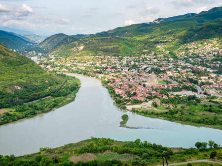 Kura and Aragvi rivers confluence near Mtskheta city from Jvari Monastery, Georgia on summer morningの写真素材