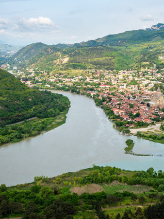 above view of Kura river near Mtskheta city from Jvari Monastery, Georgia on summer morning