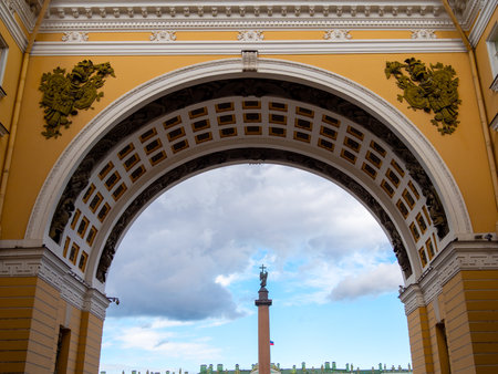 view of Alexander Column on Palace square through Arch of General Staff Building in St Petersburg city on summer dayの写真素材