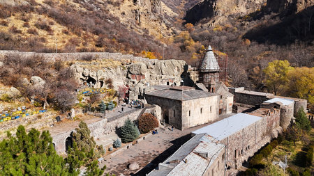 aerial view of Monastery of Geghard in Upper Azat Valley in Kotayk region of Armenia on sunny autumn dayの写真素材