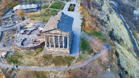aerial view of ruined Garni Temple in Azat Gorge in Kotayk region of Armenia on sunny autumn eveningの写真素材