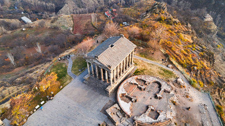 panoramic view of Garni Temple in Azat Gorge in Kotayk region of Armenia on sunny autumn eveningの写真素材
