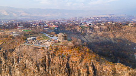 aerial view of Azat Gorge and Garni Temple and village in Kotayk region of Armenia on sunny autumn eveningの写真素材