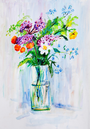 Summer bouquet of different flowers in glass vaseの写真素材