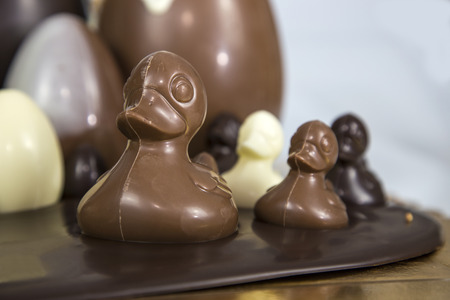 Composition of white chocolate, milk and dark chocolate for Easterの写真素材