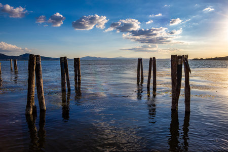 Castiglione lake in Umbria, Italy. Beautiful landscape of Castiglione lake at sunset.の写真素材