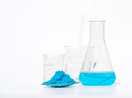 Close up inorganic chemical on white laboratory table. Copper(II) sulfate,  alcohol. Chemical...