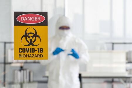 Photos taken through the glass of the lab room preventing the spread of virus research.の写真素材