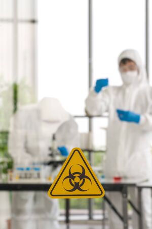 Photos taken through the glass of the lab room preventing the spread of virus research.の写真素材