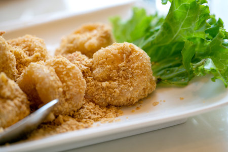 Deshelled prawns fried with golden salted egg. Crispy exterior fried prawns, whilst preserving the...