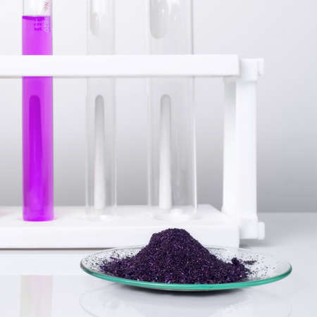 Cosmetic chemicals ingredient on white laboratory table. Potassium Permanganate Liquid, KMnO4.の写真素材