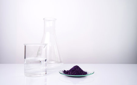 Cosmetic chemicals ingredient on white laboratory table. Potassium Permanganate, Alcohol.の写真素材