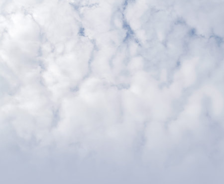 White clouds spread all over blue sky.