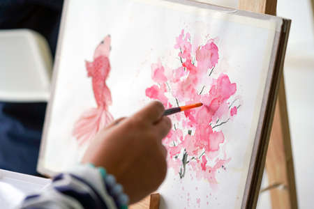 Watercolor drawings creation at painting art classes. (Pink Flower  Painting)の写真素材