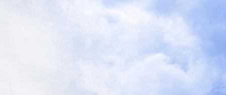 Blue sky background with white clouds. Panorama