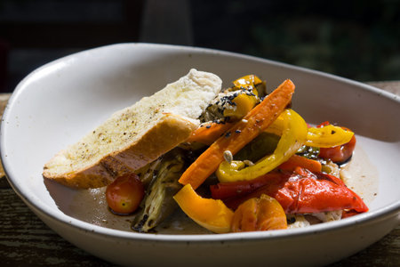 Grilled organic salad, served with black sesame dressing and Baguette.