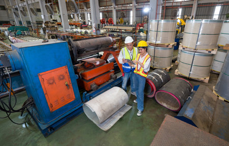 Workers harnessing technology in factory operations. Take a glimpse into the world of manufacturing...