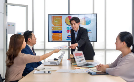 High-powered business professional discussing strategic plan and making decision at a conference...
