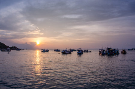 Aggregation of diving boats near the harbour before the night dive, Koh Tao, Thailandの写真素材
