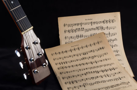 Guitar Headstock With Old Sheet Music