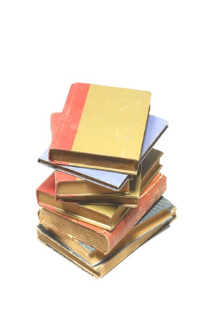 A pile of old books  isolated on white backgroundの写真素材