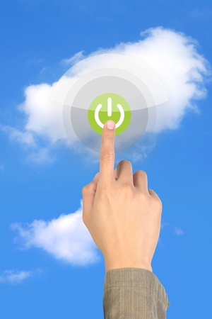  touching start on green button on cloudの写真素材