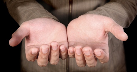human hands  on a dark  background の写真素材