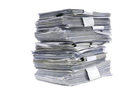 close up stack of paper on white background
