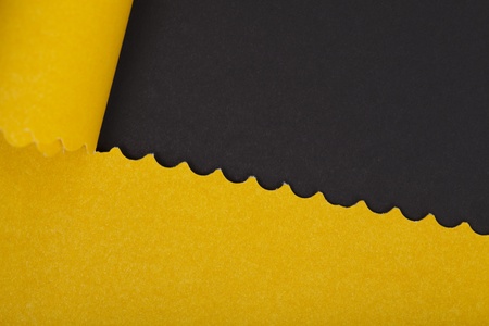 close up ripped paper on blackの写真素材