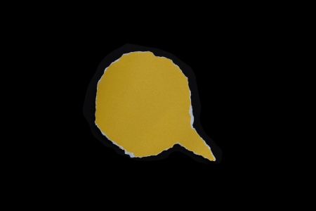 yellow paper tear bubble shape on dark background.
の写真素材