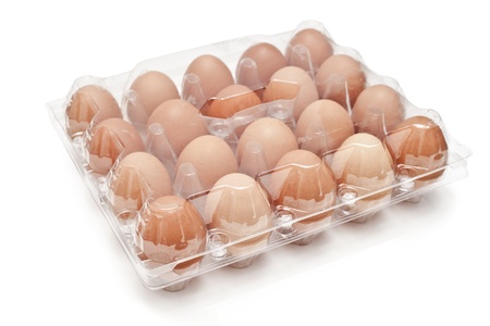brown eggs in a carton transparent package.
の写真素材