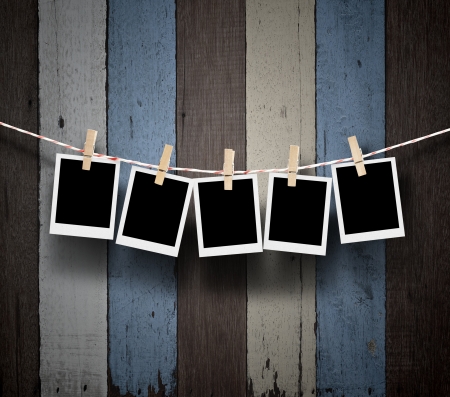 empty photos frames on wood の写真素材
