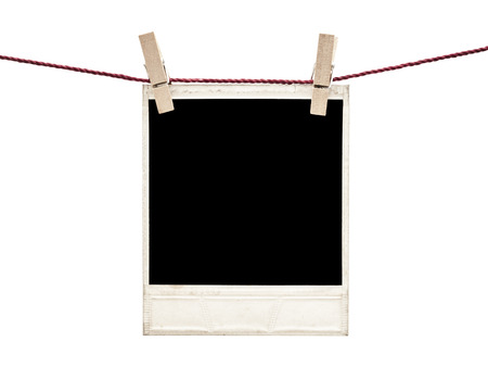 photo frame hanging isolated on whiteの写真素材