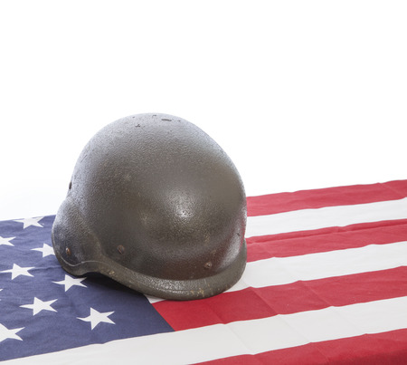 Military helmets and American flag  on white background.の写真素材