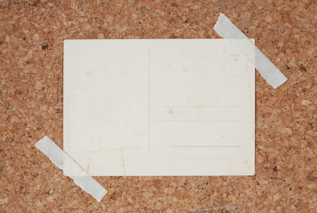 close up of postcard on brown background.の写真素材