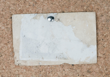 close up of an old postcard on brown background.の写真素材