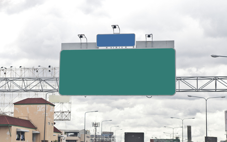 green road sign on express way,の写真素材
