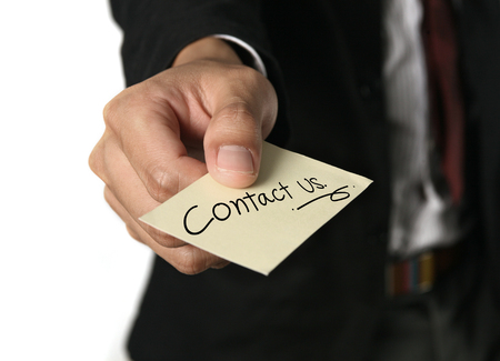 Card Contact us in hand  business manの写真素材