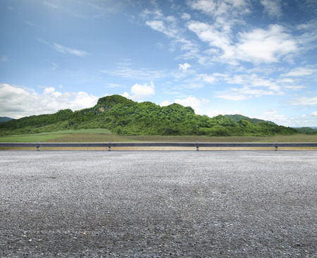 beauty Country Road Side View and mountain backgroundの写真素材