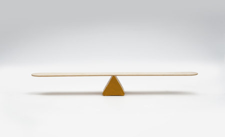 Empty seesaw balancing on white background.の写真素材