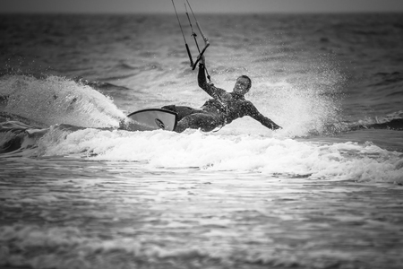 kitesurfer black and white action shotの写真素材