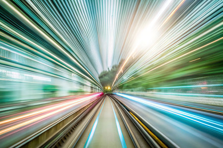 Urban tunnel, blurred motion, train, city lightsの素材