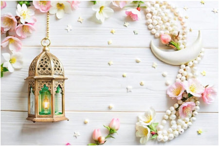 Ramadan lantern, flowers, beads, crescent moon on white woodの素材