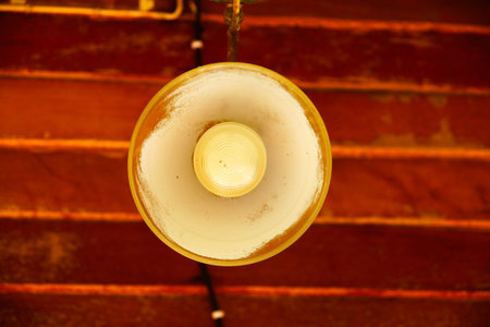 Old grunge lamp under the wooden ceiling