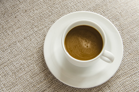 coffee cup on table backgroundの写真素材