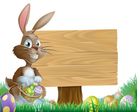 The Easter bunny holding a basket of Easter eggs with more Easter eggs around him by a wood sign boardのイラスト素材