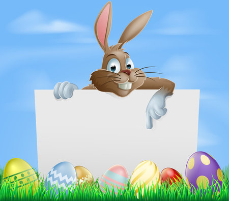 Easter bunny pointing at blank sign with painted chocolate Easter eggs in green fieldのイラスト素材